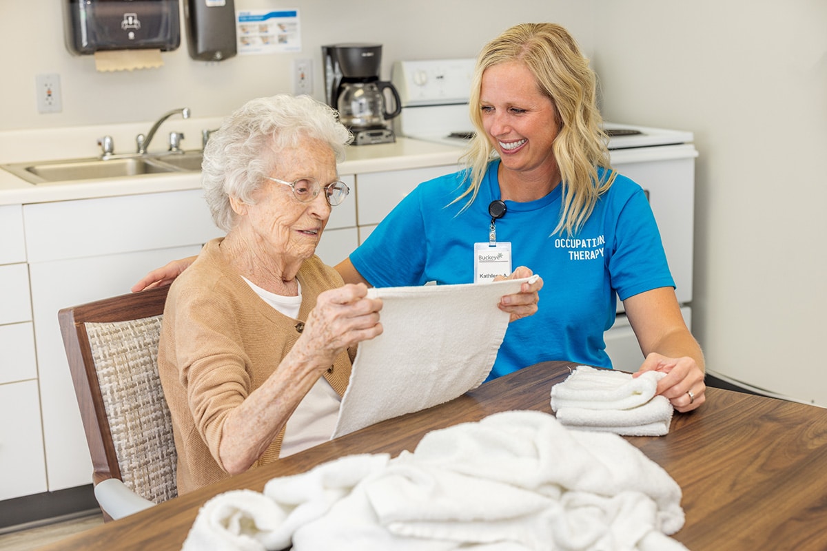 Resident folding towels with nurse